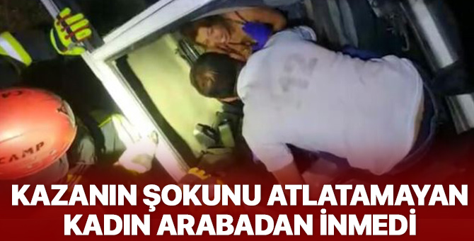 Kazanın şokunu atlatamayan kadın otomobilden çıkmak istemedi!