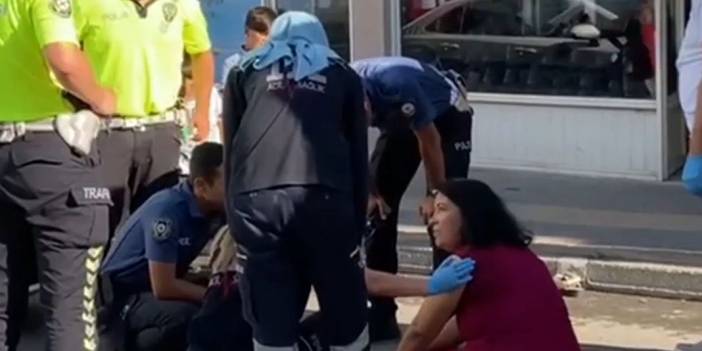 Alkollü kadın cadde ortasında oturduğu yerden kalkamadı!