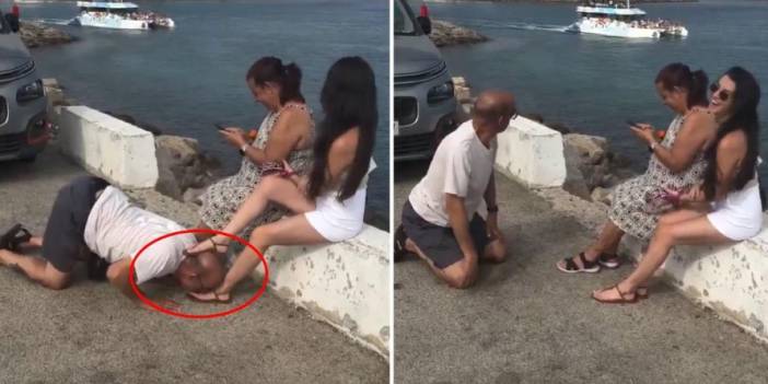 Bu adam ne yapıyor? Önce ayaklarını öptü, sonra havlamaya başladı!