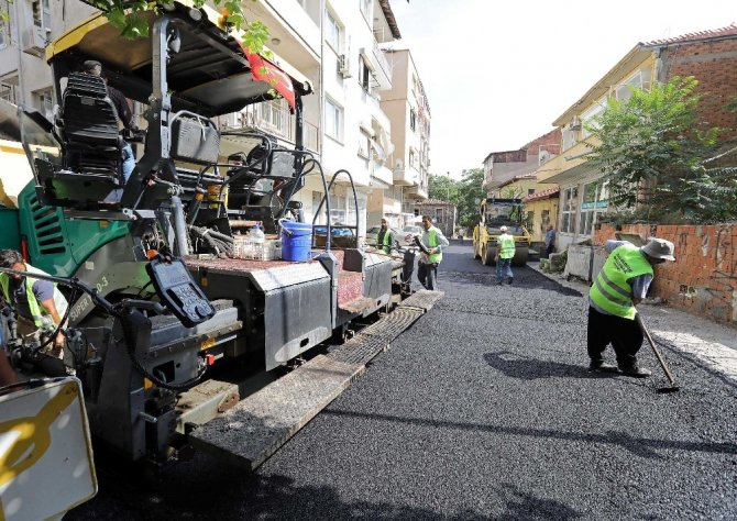 Buca yollarına asfalt serme, yama, taş parke ve kaldırım çalışmaları yapıyor