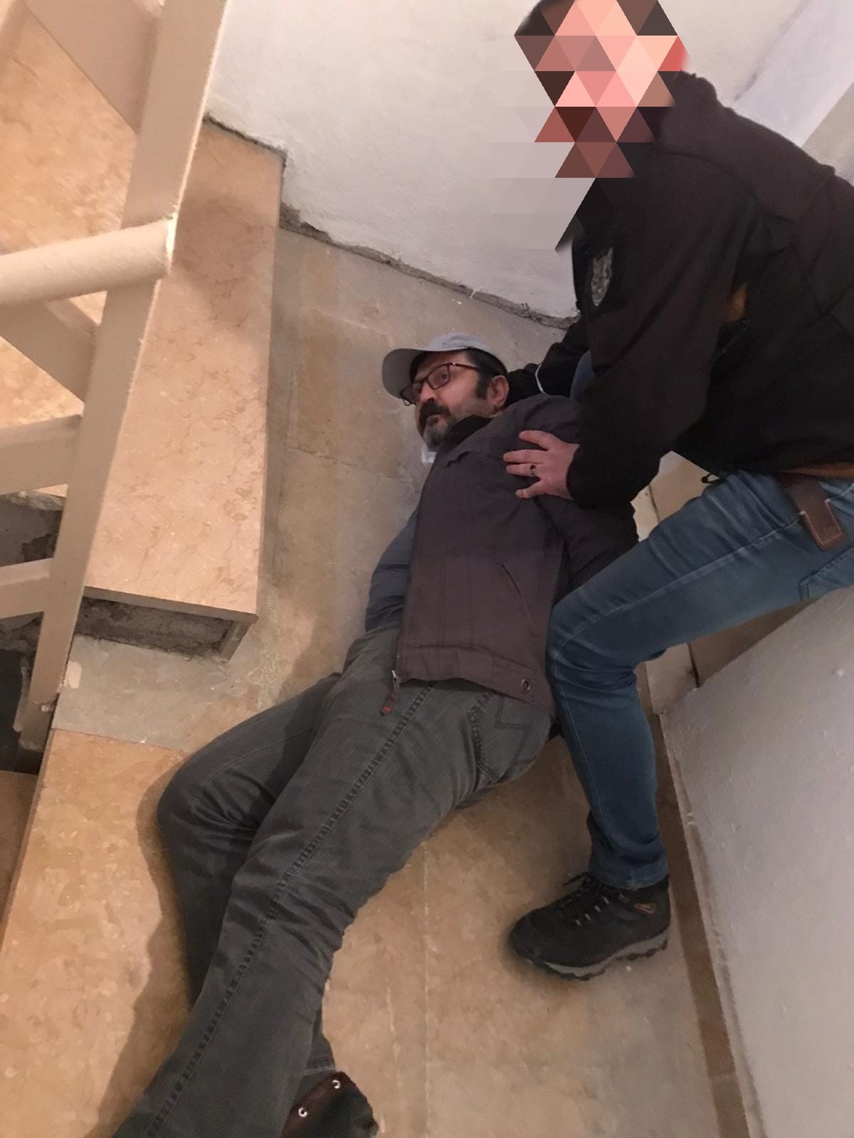 Bank Asya'nın kurucusu Kamil Yavuz M, Ankara'da sahte kimlikle enselendi