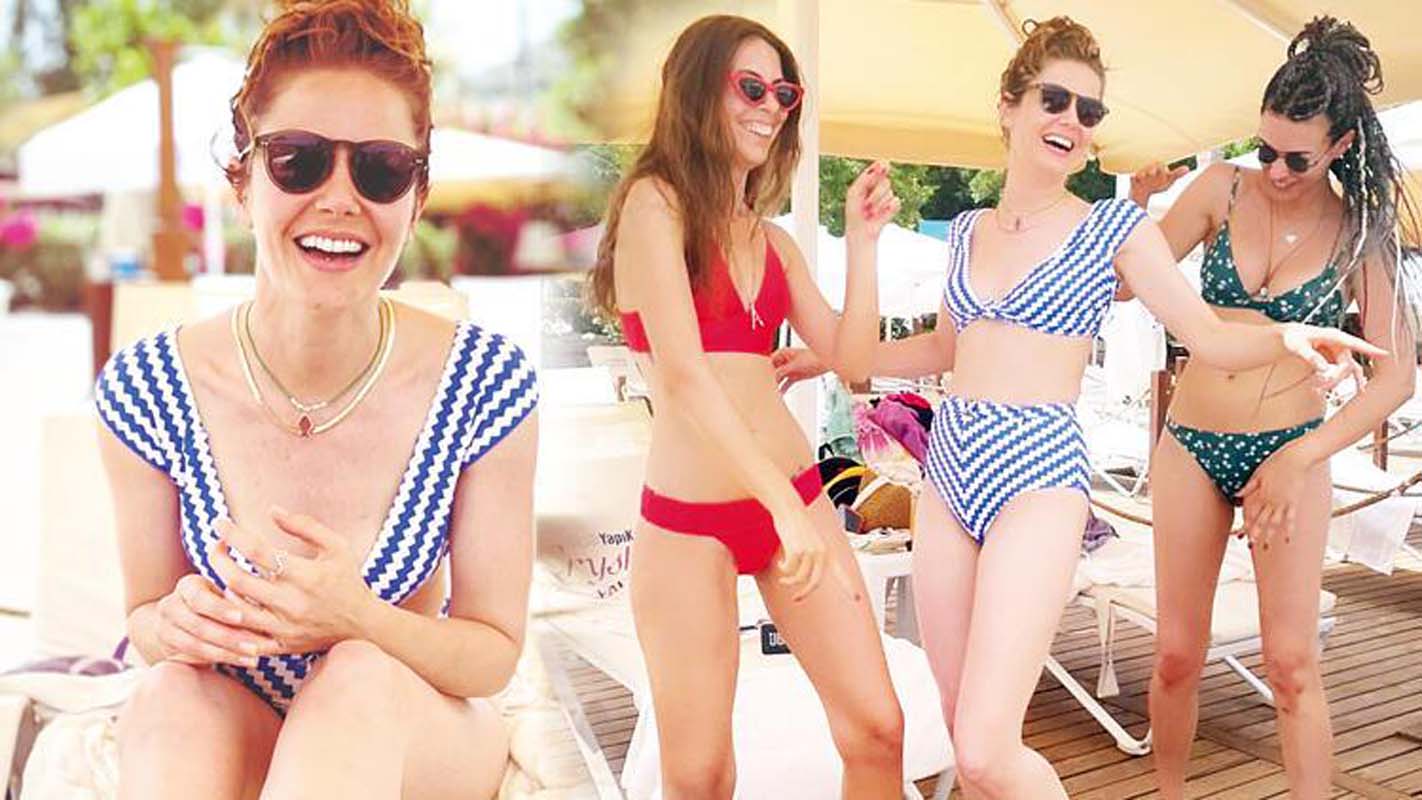 Burcu Biricik fit vücuduyla tatildeki turistlere taş çıkardı!