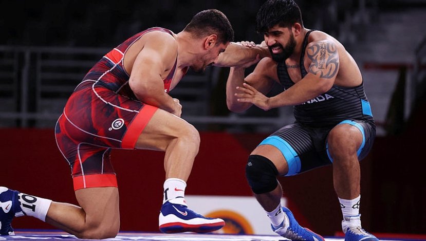 Milli güreşçi Taha Akgül Tokyo'da 125 kilo çeyrek final mücadelesinde mağlup olarak final şansını kaybetti!