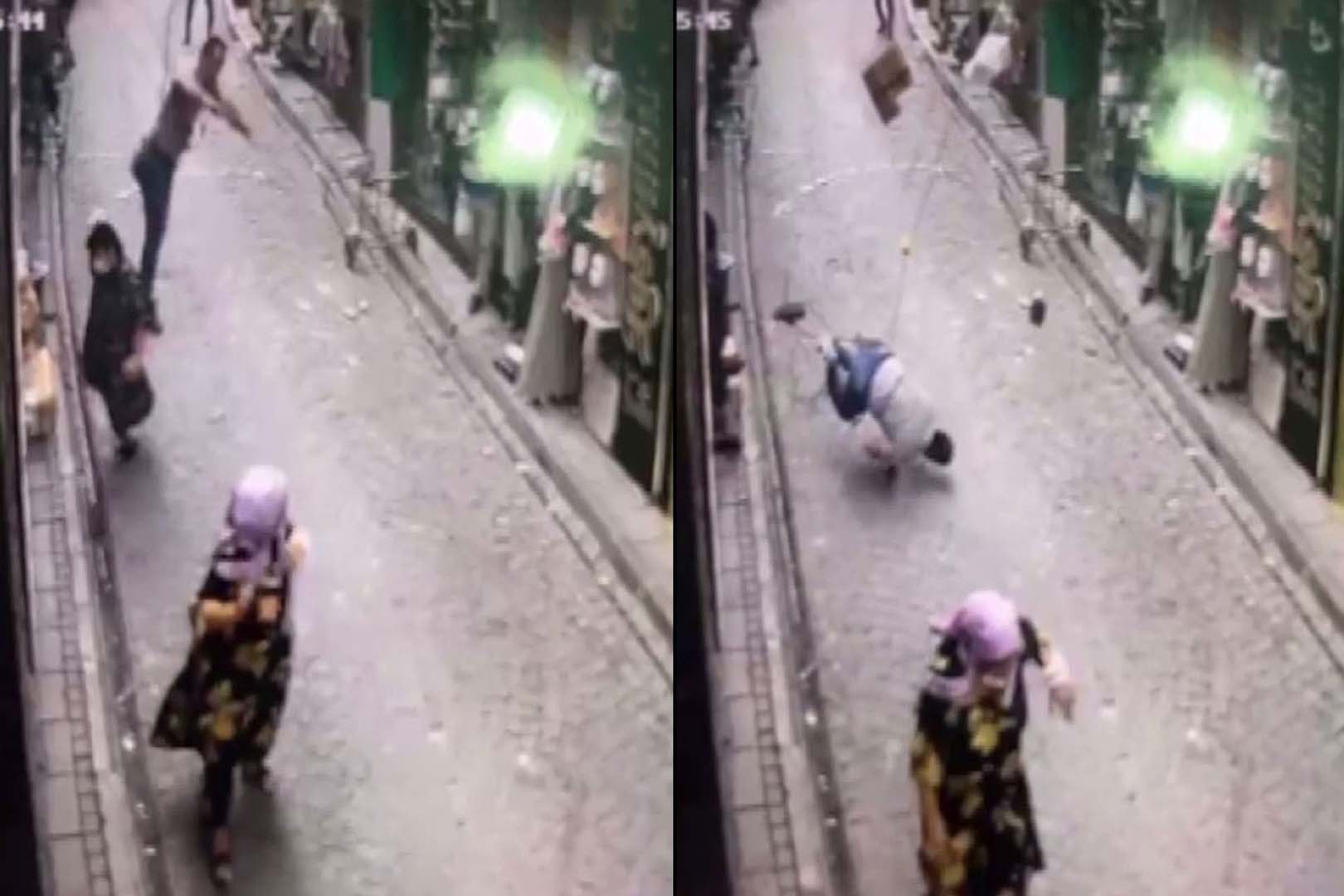 Klimayla birlikte binadan düştü, yaşlı kadın ezilmekten zor kurtuldu