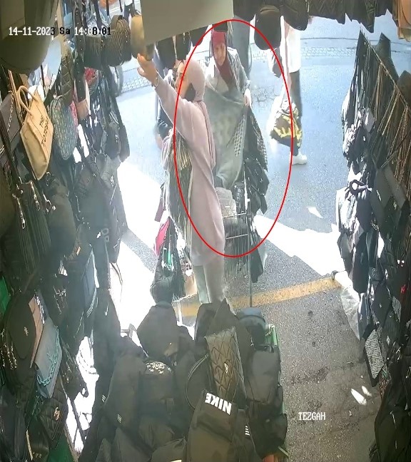 Yaşından da utanmadı! Hırsızlık yapan yaşlı kadın rahat tavırlarıyla dikkat çekti!