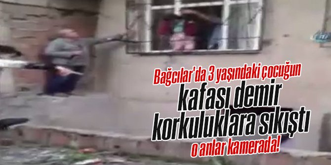 Kafası demir korkuluklara sıkışan 3 yaşındaki bebek kamerada